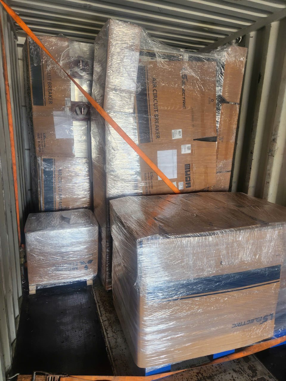Loading export cargo into a shipping container in Vietnam
