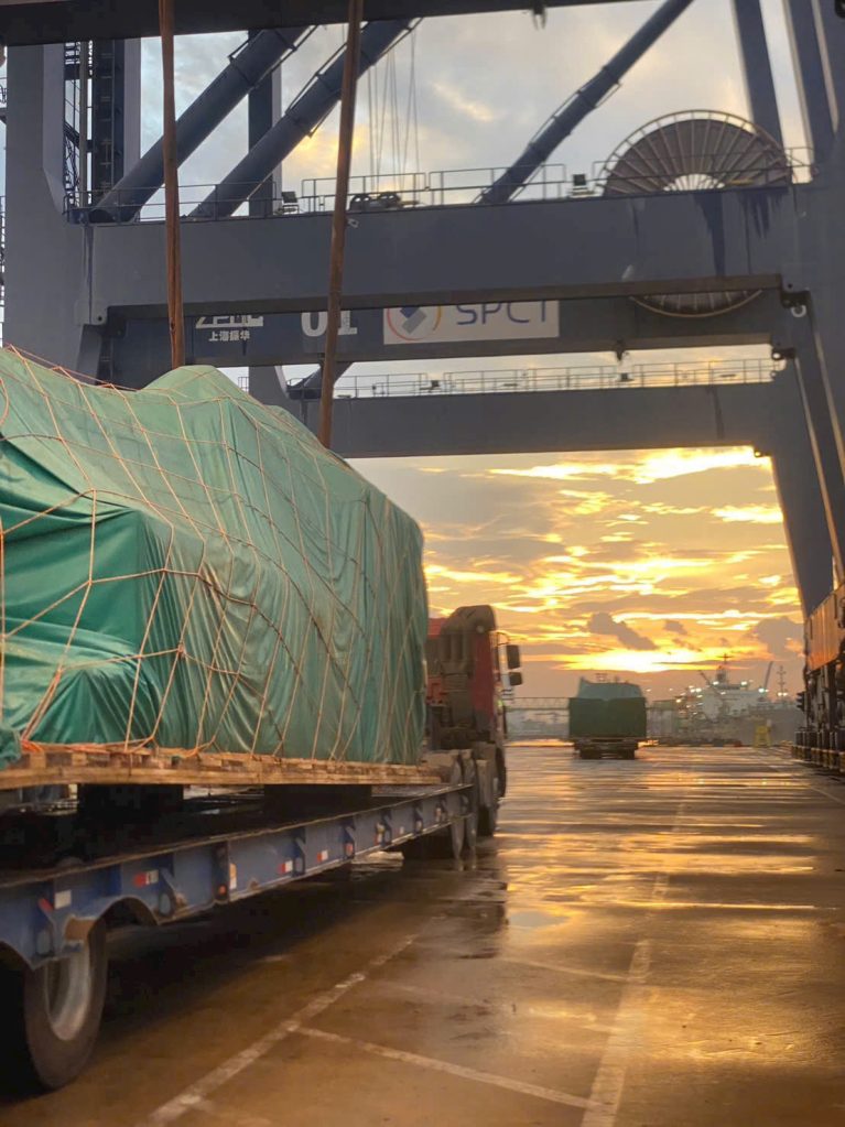 60-ton crane lifting heavy machinery under AlphaTrans supervision at Hiep Phuoc Port