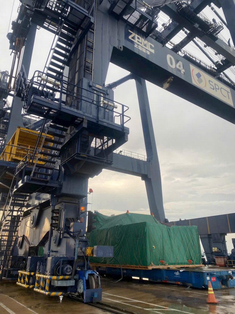 60-ton crane lifting heavy machinery under AlphaTrans supervision at Hiep Phuoc Port